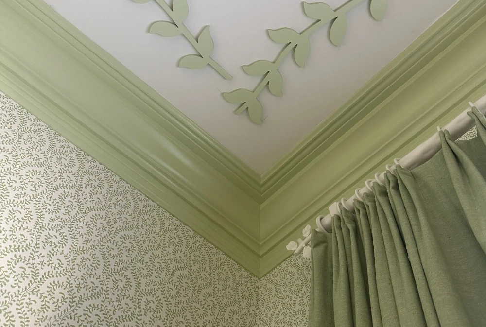 Beautiful custom trim work in a ceiling corner